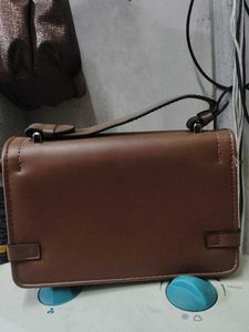 Stylish Brown Handbag with siling belt
