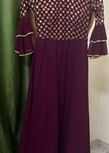 Elegant Plum Gown with Gold Embellishments