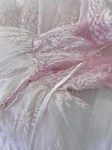 pink white toned corset lace up ballgown