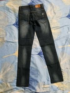 Distressed Denim Jeans