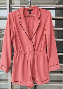 Chic Pink Romper with Black Trim
