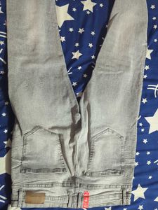 Ripped Grey Jeans