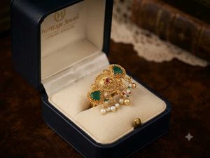 Elegant Gold Pendant with Pearls & Green Stones