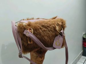 brown fur sling bag
