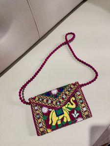 Embroidered Elephant Sling Bag