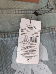 Light Wash Flare Jeans with Bow Detail