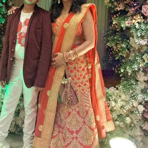Stunning Coral &amp; Gold Embroidered Lehenga Choli
