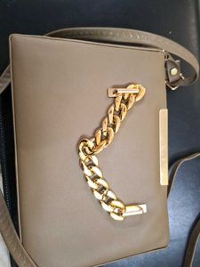 Chic Taupe Handbag with Gold Chain Detail