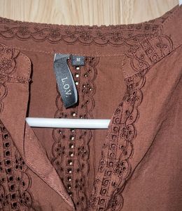 Elegant Brown Top with Intricate Embroidery