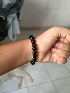 Black Beaded Bracelet with Blue Heart Charm