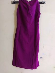 Dark Purple Shiny A Line Kurti Of Size-xs/'s' available...Length Is Just Below The Knee.....Apair Of Sleeves With An Extra Button Available Inside It