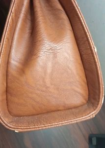 Chic Brown Handbag with Ring Handle