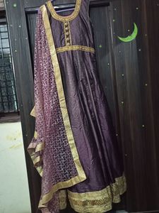 beautiful purple color heavy gown with bottom and dupatta