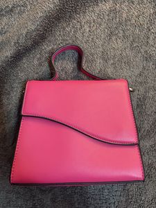 brand new Barbie pink bag with crossbody strap