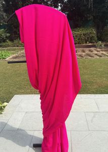 Vibrant Pink crepe Silk Saree with Tassels
