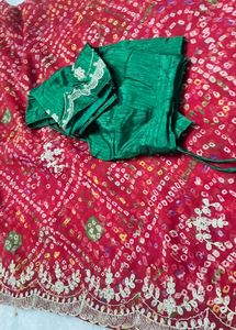 Elegant Red Bandhani Saree with Embellished Border