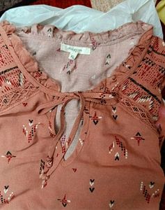 Branded Top With Pretty Colour N Beautiful Sleeves... Suitable For Summer
