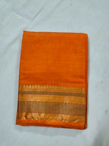 Vibrant Orange Saree with Gold Border