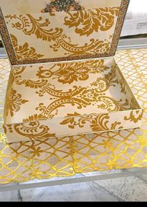 9. Decorative Gift Box with Floral Accent