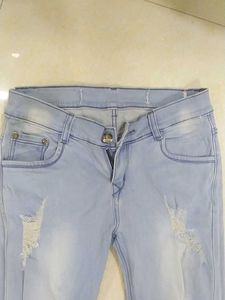 A Ripped Blue Jeans