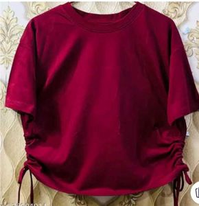 Maroon T-shirt with black pants
