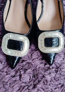 Elegant Black Heels with Embellishment