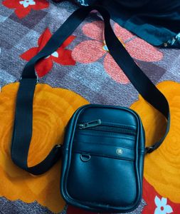 Unisex Sling Bag At Good Condition Black Colour
