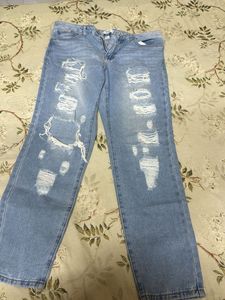 Distressed Light Wash Denim Jeans