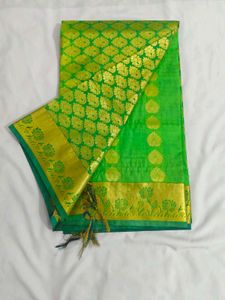 Vibrant Green Silk Saree with Gold Border