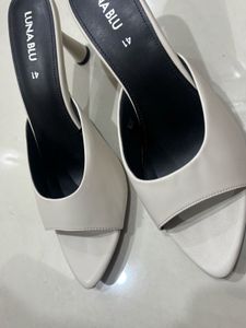 Elegant White Heeled Mules