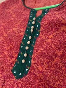 Orange Kurta with Green Neckline