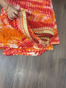 Vibrant Tie-Dye Saree with Golden Border