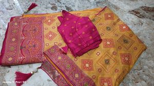 Vibrant Yellow Saree with Pink Blouse