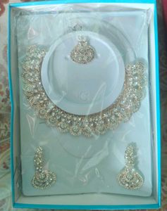 golden and silver diamond necklace set