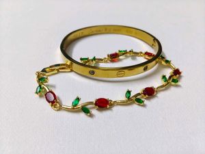 Elegant Gold Bracelet with Red &amp; Green Stones
