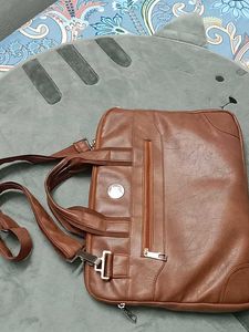 👜