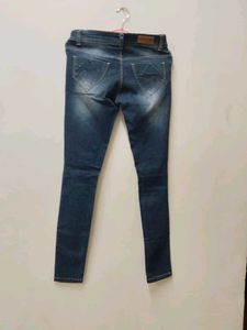 Distressed Denim Jeans