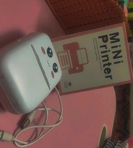 Mini Portable Chargeable Inkless Printer.