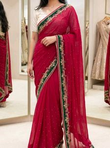 Pink Saree with Embroided Green Border