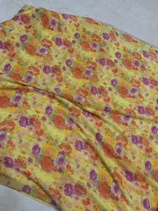 Beautiful Yellow Saree With Floral Design