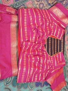 Beautiful black saree with Pink Golden Border