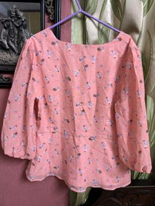 Chic Peach Floral Peplum Top