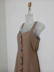 beige sleeveless A-line mini dress