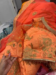 Stunning Orange Embroidered Lehenga Choli