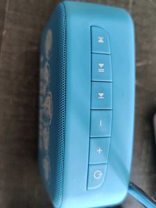 Saregama Carvaan Mini Legends in red, blue green