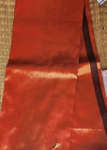 Graceful Tissue Saree – Lightweight, Glossy