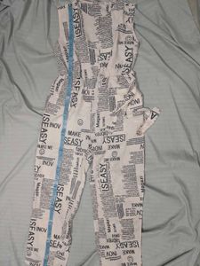 Newspaper Print Sleeveless Jumpsuit