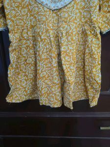 Yellow Printed Kurta with Neck Embellishment