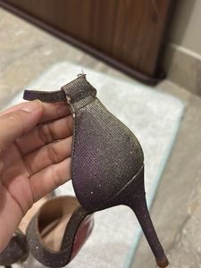 shiny pair of stelletoes