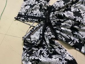 foral deep v neck dress with cross back design